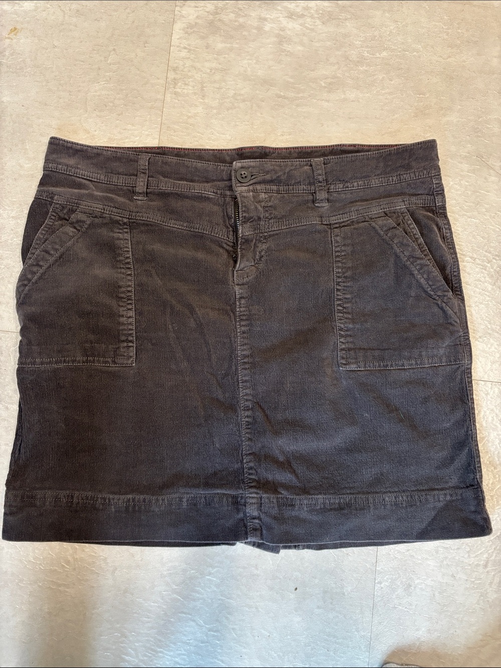The North Face Black Corduroy Skirt with Red Trim on the inside